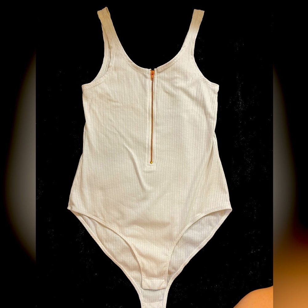 Woman’s white bodysuit tank